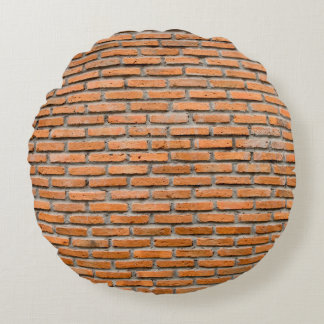 Achtergrond van oude  bakstenen, antiek rond kussen