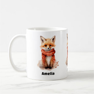 Adorable vosjongen in een rode sjaal koffiemok