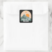 Adventure begint vierkante sticker (Tas)
