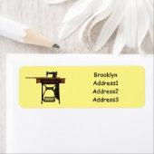 Afbeelding cartoon naaimachine etiket (Insitu)