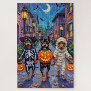 Affenpinscher honden gaan langs voor trick-or-trea legpuzzel