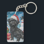 Affenpinscher Winter Wonderland Christmas Joie<br><div class="desc">Ce design festif reflète l'esprit joyeux de la période des fêtes, avec un adorable petit portant un chapeau de Père Noël. Le chien est niché dans un pays des merveilles hivernales, avec un bonhomme de neige, un sapin de Noël décoré et des cadeaux joliment emballés. Les flocons de neige tombent...</div>