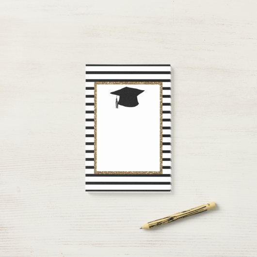 Afstuderen met zwarte en goudglitter post-it® notes (Op bureau)