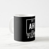 Ah! Het element van de schenkingschemie bij ondern Koffiemok (Voorkant links)