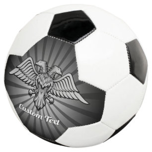 Aigle gris avec deux têtes balle de football