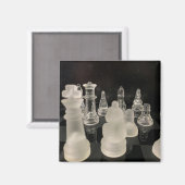 Aimant avec image d'échecs. Arrière - plan noir. (Recto/Verso)