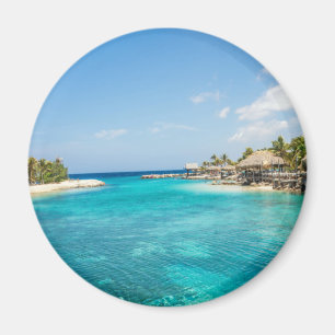 Aimant Belle plage tropicale Bleue aux huttes de chaume