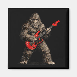 Aimant Bigfoot drôle jouant du rock and roll à la guitare