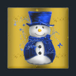 Aimant Blue Snowman sur Gold Christmas<br><div class="desc">Un motif de Noël mignon et coloré avec des bonhomme de neige vêtus d'un chapeau et de gilets en velours bleu,  sur un arrière - plan doré festif aux étoiles dorées pour ajouter une touche chic et fantaisiste à vos décorations de maison de Noël cette année.</div>