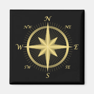 Aimant Boussole dorée classique sur fond noir