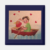 Aimant Boy Holding Heart in Boat (Devant)