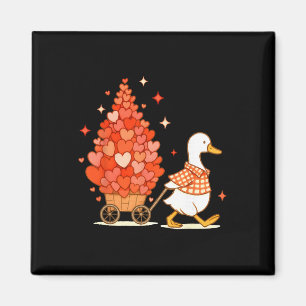 Aimant Canard mignon tirant un chariot en forme de cœur,