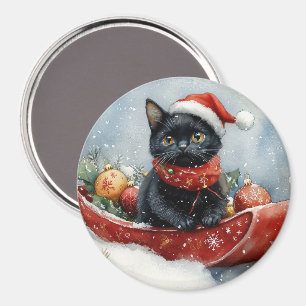 Aimant Chat noir dans un traîneau Laissez neige Noël