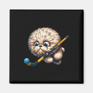 Aimant Chien de hockey mignon avec un bâton et Byll Kawai