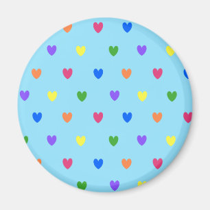 Aimant Coeurs de polka arc-en-ciel sur bleu bébé