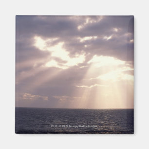 Aimant Coucher de soleil brillant par des nuages