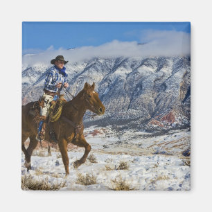 Aimant Cowboy à cheval portant des Chaps en cuir