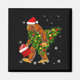 Aimant Croyant Sasquatch Bigfoot portant un sapin de Noël