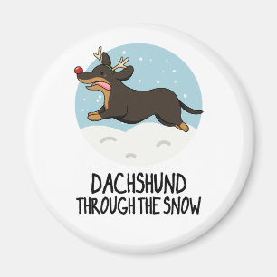 Aimant Dachshund À Travers Le Jeu De Noël De Neige Drôle