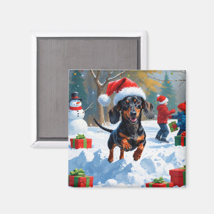 Aimant Dachshund courant dans la neige avec un chapeau de