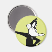 Aimant DAFFY DUCK™ penché contre un mur (Recto/Verso)