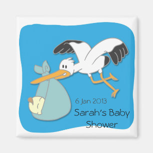 Aimant de baby shower bébé porté par une cigogne
