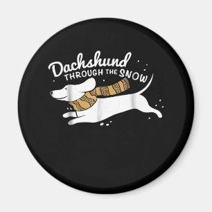 Aimant Don de chien Dachshund À Travers La Neige