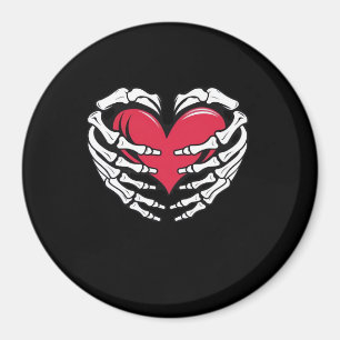 Aimant Ed Heart Dans Les Mains Squelettiques Classique