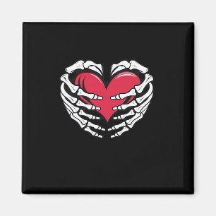 Aimant Ed Heart Dans Les Mains Squelettiques Classique