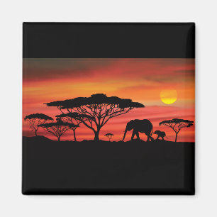 Aimant Éléphant et coucher de soleil orange sur la Sereng