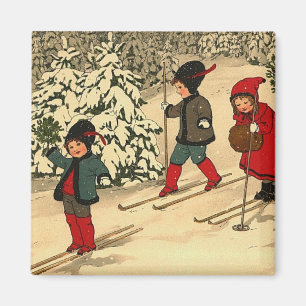 Aimant Enfants vintage skiant à travers une forêt enneigé