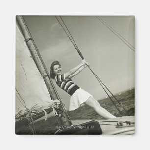 Aimant Femme tenant le calage sur le yacht