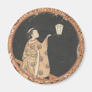 Aimant Fleurs admiratives de prune de jeune femme à l'ar