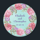 Aimant Floral Watercolor Wreath Joli Mariage<br><div class="desc">Un joli mariage garde/commémoratif ou enregistrer l'aimant de date. Une belle illustration botanique avec une couronne circulaire de jolies fleurs d'aquarelle rose et violet avec des feuilles verts entre les deux. Le design floral est composé de pivoines roses et d'anémones violets. L'arrière - plan est une texture d'aquarelle douce vert...</div>
