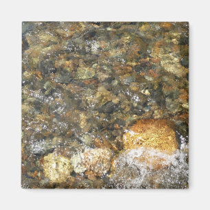 Aimant Galets brun et gris usés par la rivière, abstrait