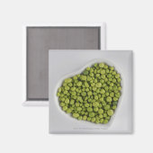 Aimant Gros plan de galets verts dans un bol en forme de  (Recto/Verso)