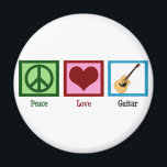 Aimant Guitare Peace Love<br><div class="desc">Un signe de paix, un coeur et un design de guitare font un grand cadeau à quelqu'un dans un groupe.</div>