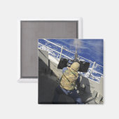 Aimant Gunners Mate tirant une mitrailleuse de calibre 50 (Recto/Verso)