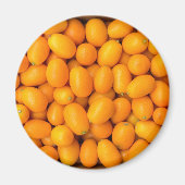 Aimant Heap of orange kumquats dans cardboard box (Devant)