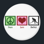 Aimant Hockey sur gazon Peace Love<br><div class="desc">Le signe de paix,  le coeur,  et la silhouette d'un joueur de hockey sur gazon en action.</div>