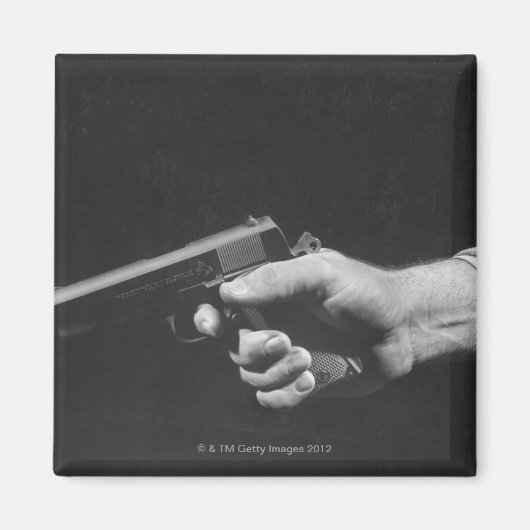 Aimant Homme tenant un pistolet (Devant)