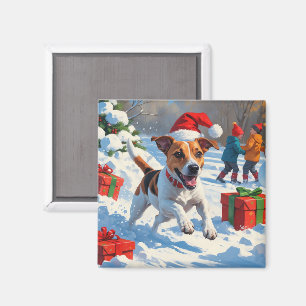 Aimant Jack Russell courant dans la neige avec un chapeau