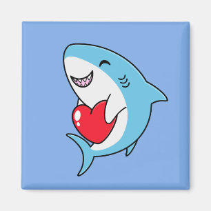 Aimant Joli requin bleu tenant un coeur rouge