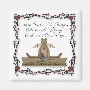 Aimant L'amour soutient tout l'ours de nounours d'ange de