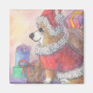 Aimant Le corgi poursuit dans le costume du père noël