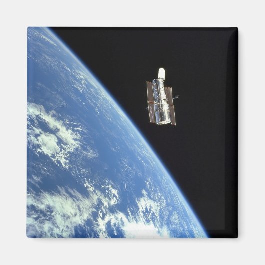 Aimant Le télescope spatial Hubble avec une terre bleue (Devant)