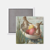 Aimant Les lapins de Pâques dans un bateau avec des oeufs (Recto/Verso)