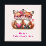 Aimant Les mignons renards orange en amour Saint-Valentin<br><div class="desc">Aimant de la Saint Valentin avec une adorable image de 2 renards portant de mignons verres de coeur teintés rose. Décoré avec des accents de coeur.</div>