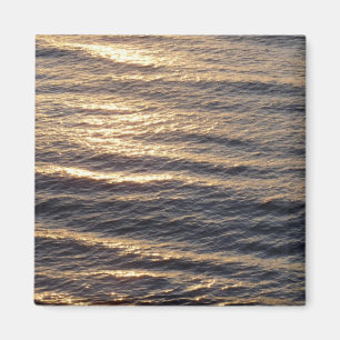 Aimant Lever de soleil sur les eaux de l'océan apaisant l