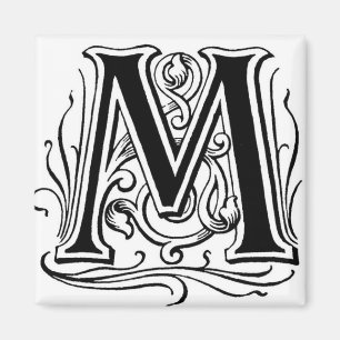 Aimant Marquez avec des lettres le ` M' dans le noir -